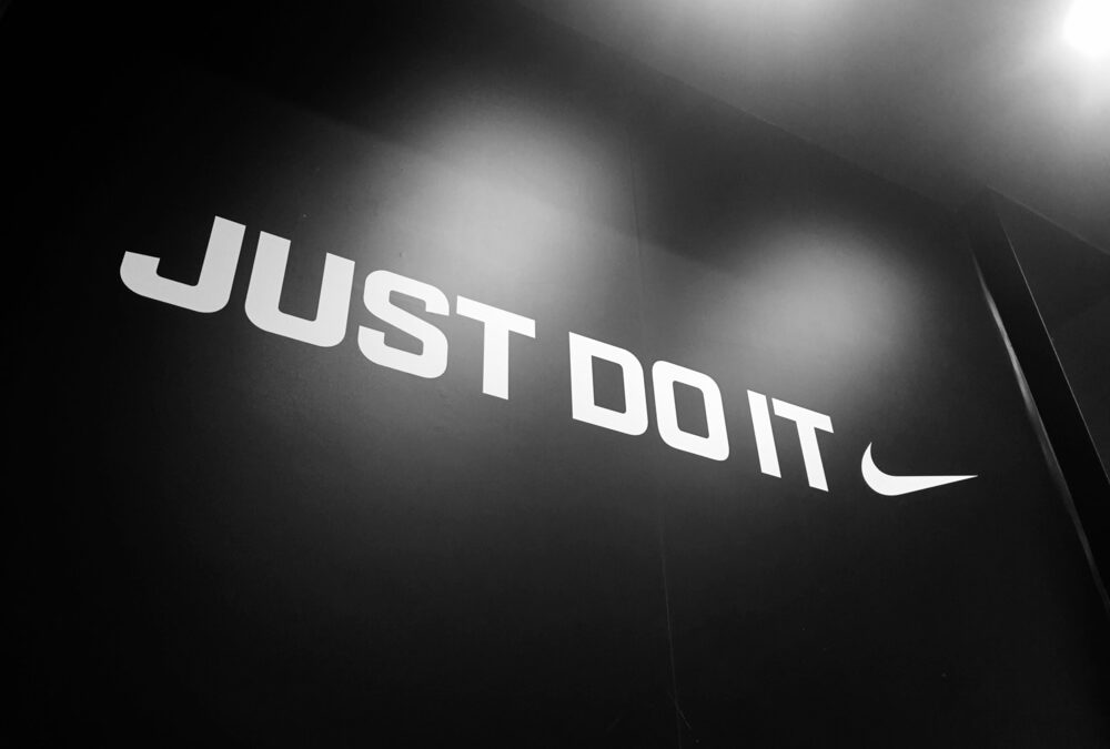 Nike, Tech and Health Stocks Slip; Amazon Hits $1 Trillion