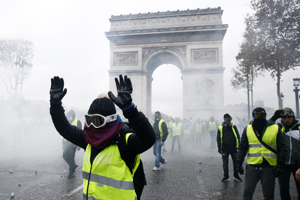 France Bracing for More Riots Despite Gas Tax Retreat