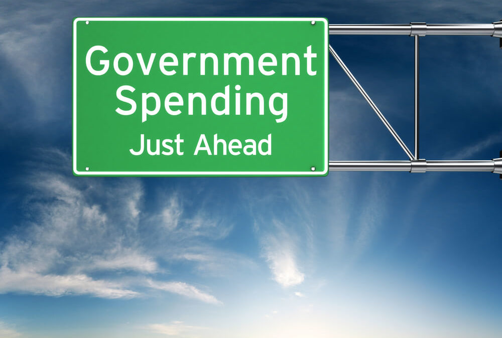 US Economy Dodges Threat of Big Spending Cuts, Government Default