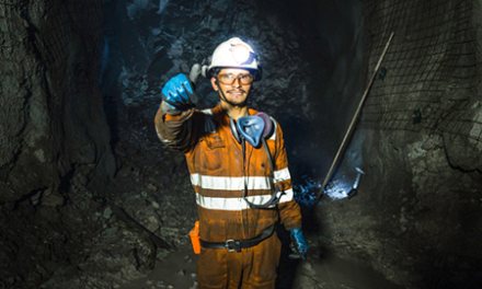 miner inside mine gives thumbs-up