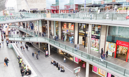 people walking in open air shopping center